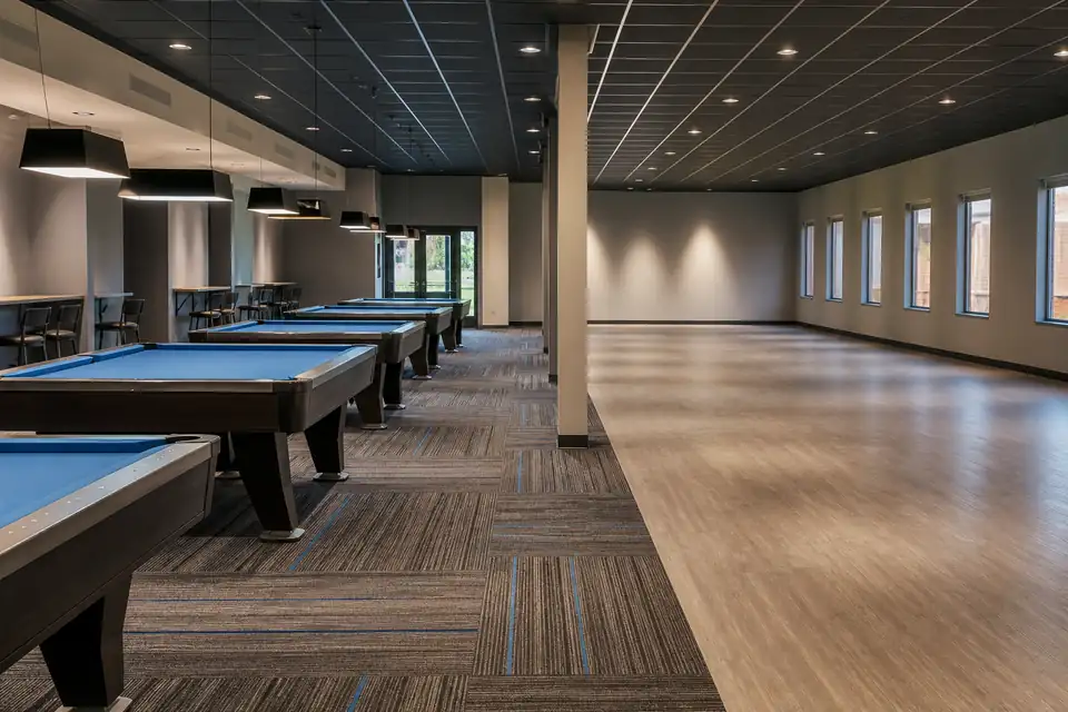 Empty billiard club with installed pool tables and reserved expansion space